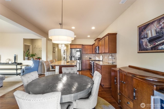 5418 Bennett Ave SE, Auburn, WA 98092 - dining area featuring dark wood-style floors and recessed lighting