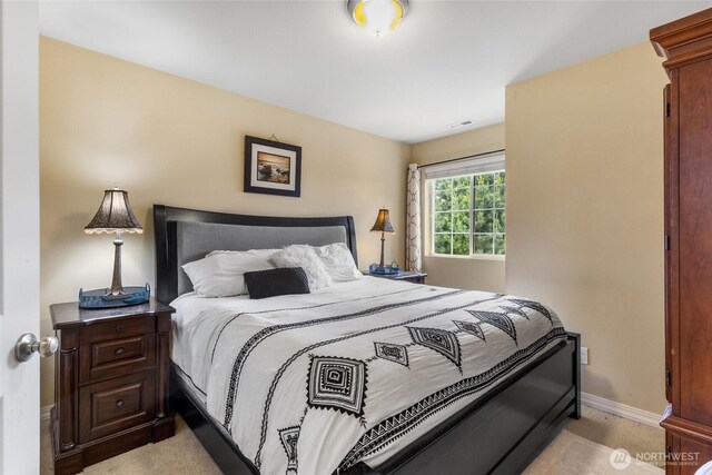 5418 Bennett Ave SE, Auburn, WA 98092 - bedroom with baseboards and light colored carpet