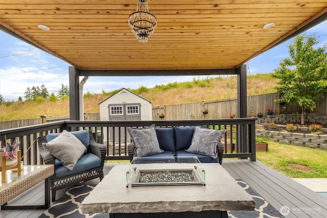 5418 Bennett Ave SE, Auburn, WA 98092 - wooden deck with an outdoor living space with a fire pit and a fenced backyard