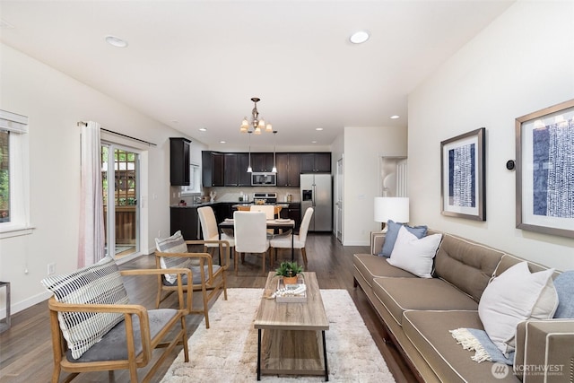 22326 35th Dr SE, Bothell, WA 98021 - living room featuring a chandelier, dark wood-type flooring, recessed lighting, and baseboards