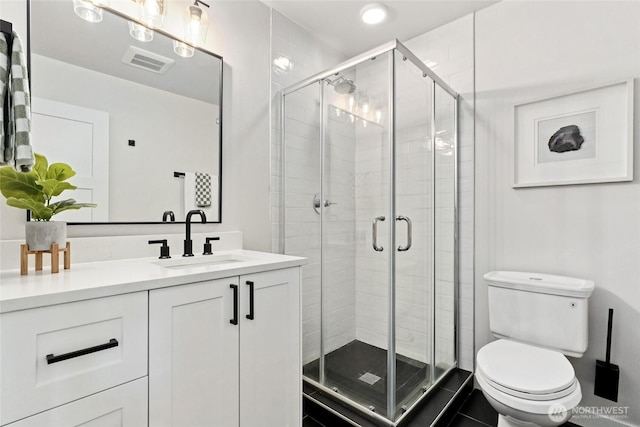 6014 40th Ave NE Unit B, Seattle, WA 98115 - bathroom with vanity, toilet, and a stall shower