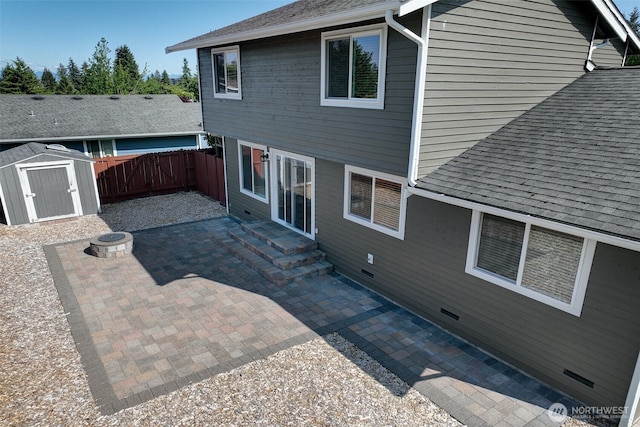 109 77th Pl SW, Everett, WA 98203 - rear view of property featuring a patio area, a shingled roof, and a fire pit