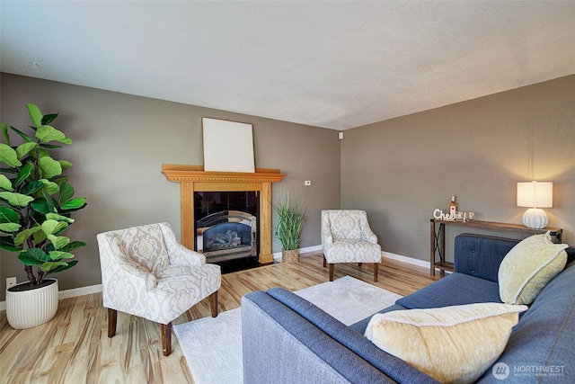 109 77th Pl SW, Everett, WA 98203 - living area with wood finished floors, a tile fireplace, and baseboards