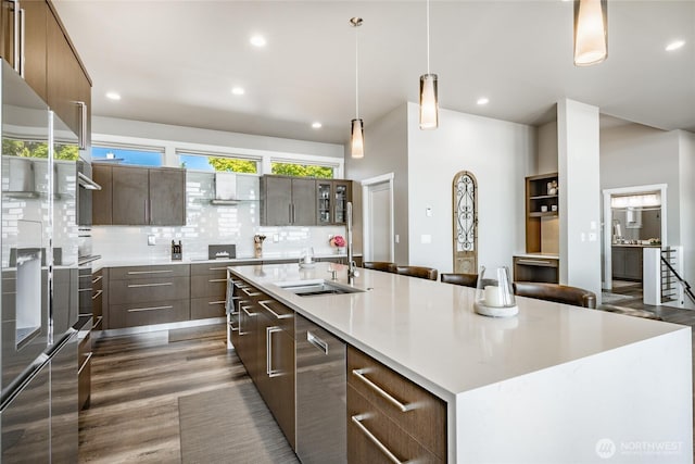 8054 Makah Rd, Birch Bay, WA 98230 - kitchen featuring a large island, modern cabinets, decorative backsplash, stainless steel dishwasher, and dark wood-type flooring