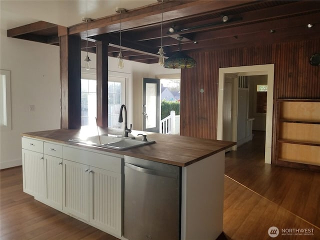 3504 L Pl, Seaview, WA 98644 - kitchen featuring stainless steel dishwasher, wooden counters, a sink, beam ceiling, and dark wood-type flooring