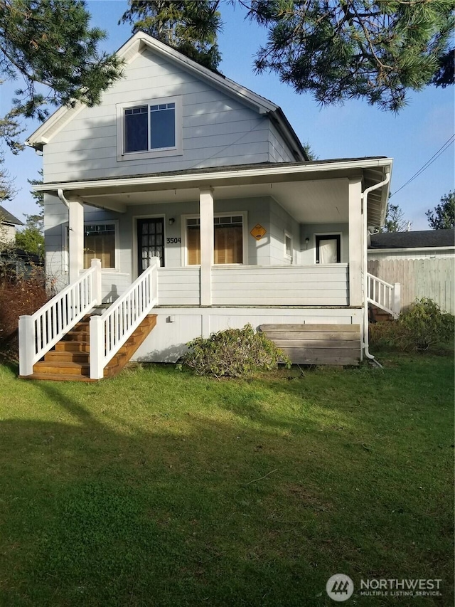 3504 L Pl, Seaview, WA 98644 - view of front of home with covered porch and a front yard