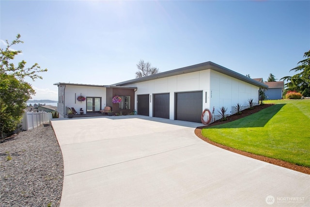 8068 Niska Rd, Blaine, WA 98230 - view of front of home with concrete driveway, french doors, and a garage