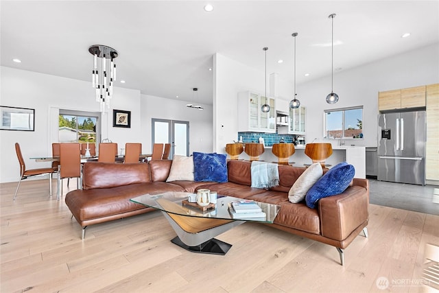 8068 Niska Rd, Blaine, WA 98230 - living room featuring light wood-style flooring, recessed lighting, and french doors