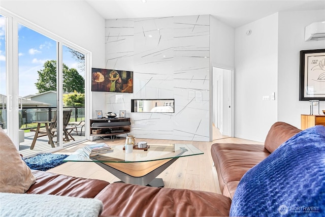 8068 Niska Rd, Blaine, WA 98230 - living area featuring wood finished floors and a wall unit AC