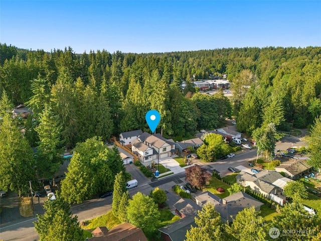 10602 NE 137th Pl, Kirkland, WA 98033 - aerial overview of property's location featuring a forest and nearby suburban area