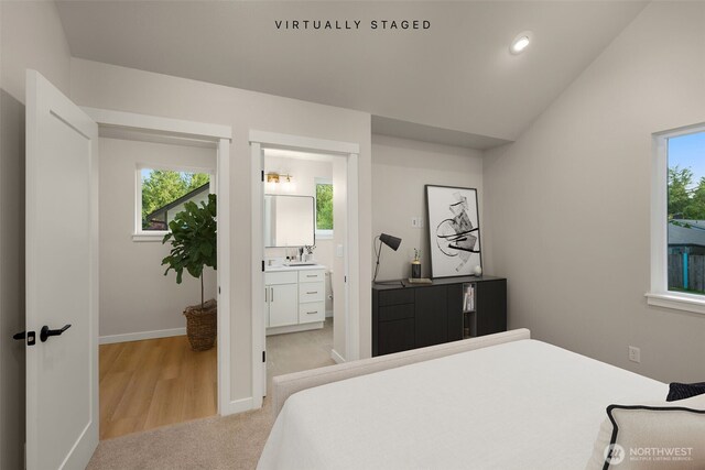 10602 NE 137th Pl, Kirkland, WA 98033 - bedroom with light colored carpet, recessed lighting, connected bathroom, and lofted ceiling