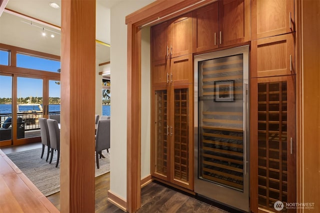 1104 Lakeside Ave S, Seattle, WA 98144 - wine cellar with dark wood-type flooring and beverage cooler