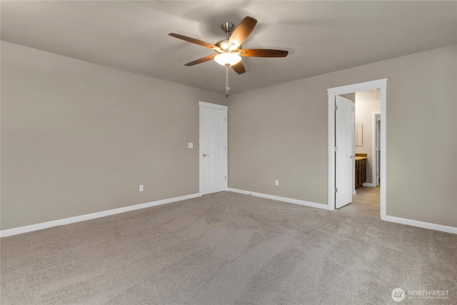 812 Bodie Ct SE, Lacey, WA 98513 - empty room with a ceiling fan and light colored carpet