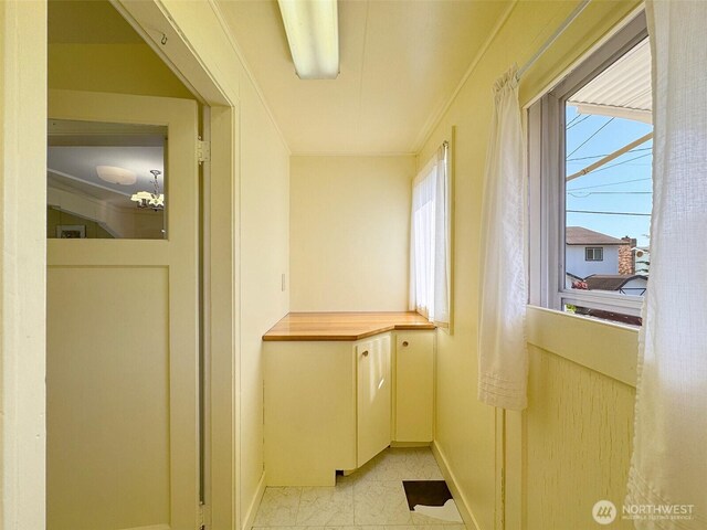13151/2 W 5th St, Port Angeles, WA 98363 - corridor featuring baseboards and crown molding