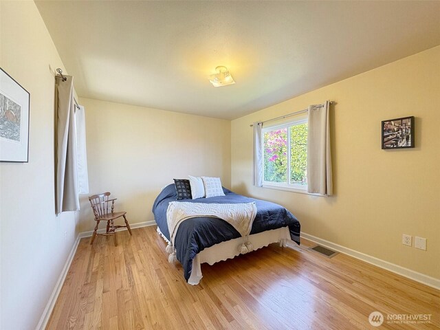 13151/2 W 5th St, Port Angeles, WA 98363 - bedroom featuring light wood-style floors and baseboards