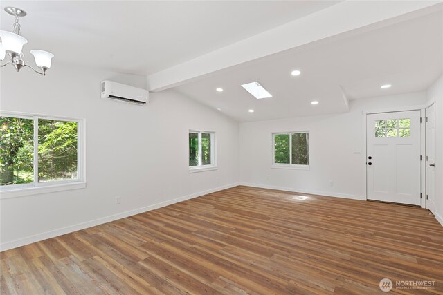 29722 State Highway 3 NE, Poulsbo, WA 98370 - entryway featuring a wall mounted air conditioner, a chandelier, wood finished floors, baseboards, and recessed lighting