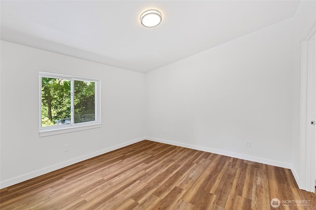 29722 State Highway 3 NE, Poulsbo, WA 98370 - empty room with baseboards and wood finished floors