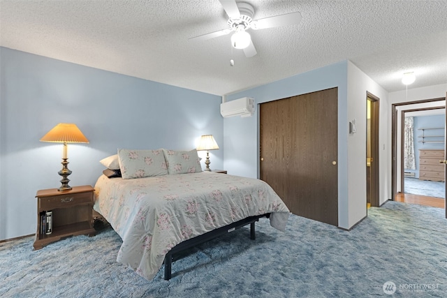 10610-10608 109th St SW, Lakewood, WA 98498 - bedroom featuring a wall mounted air conditioner, carpet floors, a closet, a textured ceiling, and ceiling fan