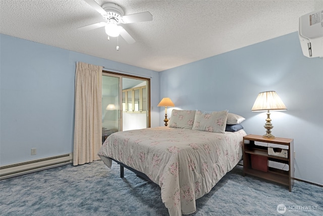 10610-10608 109th St SW, Lakewood, WA 98498 - carpeted bedroom featuring a textured ceiling, a baseboard radiator, a ceiling fan, a wall mounted air conditioner, and baseboards