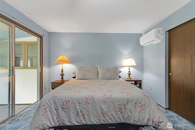 10610-10608 109th St SW, Lakewood, WA 98498 - bedroom with a wall mounted air conditioner, a textured ceiling, and carpet flooring