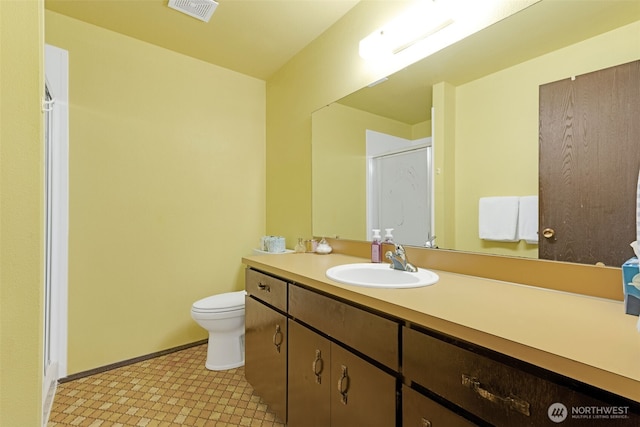 10610-10608 109th St SW, Lakewood, WA 98498 - full bath with toilet, vanity, a shower stall, and baseboards