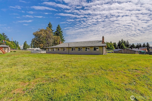 10610-10608 109th St SW, Lakewood, WA 98498 - back of house featuring a chimney