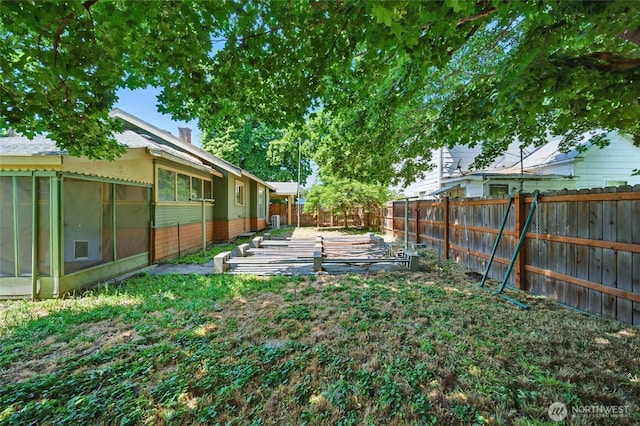507 S 3rd St, Dayton, WA 99328 - fenced backyard with a sunroom