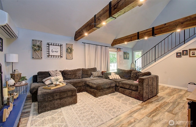 10012 NE 39th St, Vancouver, WA 98662 - living area with light wood finished floors, an AC wall unit, stairway, and baseboards