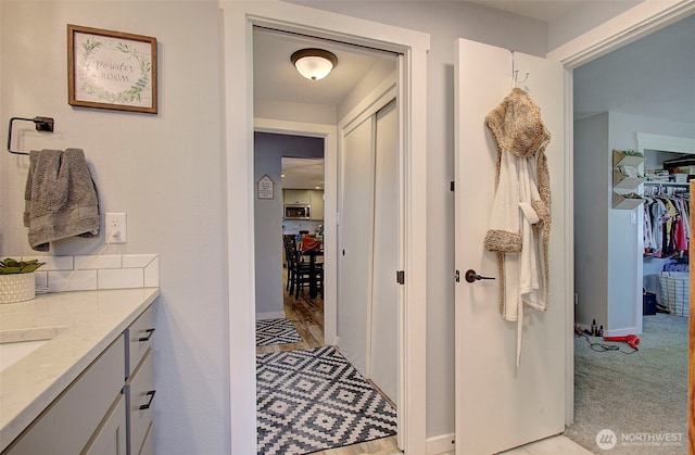 10012 NE 39th St, Vancouver, WA 98662 - bathroom featuring vanity and baseboards