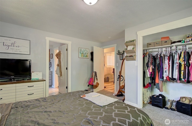 10012 NE 39th St, Vancouver, WA 98662 - carpeted bedroom with a closet, ensuite bath, and baseboards