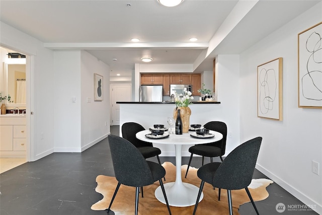1909 10th Ave W Unit 203, Seattle, WA 98119 - dining area featuring baseboards and recessed lighting