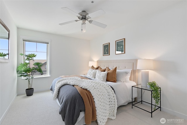 1909 10th Ave W Unit 203, Seattle, WA 98119 - carpeted bedroom featuring baseboards and a ceiling fan