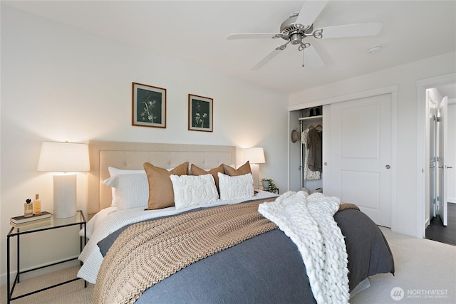 1909 10th Ave W Unit 203, Seattle, WA 98119 - bedroom featuring carpet flooring, a closet, and a ceiling fan