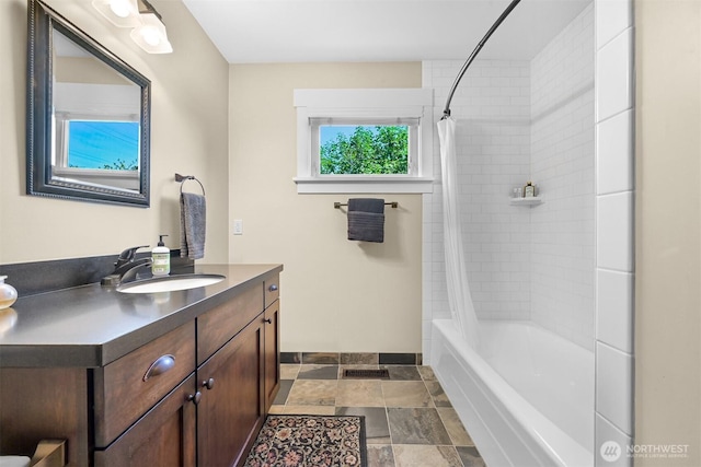 1605 Donovan Ave, Bellingham, WA 98225 - full bath featuring vanity, shower / bath combo with shower curtain, and stone finish floors