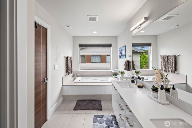 32867 Madrona Ave SE, Black Diamond, WA 98010 - full bathroom featuring double vanity, a bath, tile patterned floors, and recessed lighting
