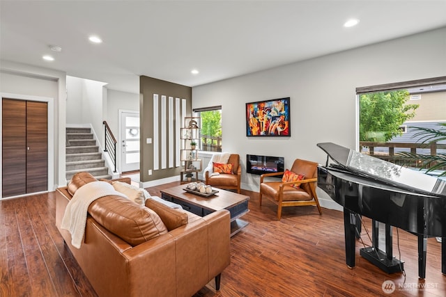 32867 Madrona Ave SE, Black Diamond, WA 98010 - living area featuring dark wood finished floors, stairs, and recessed lighting