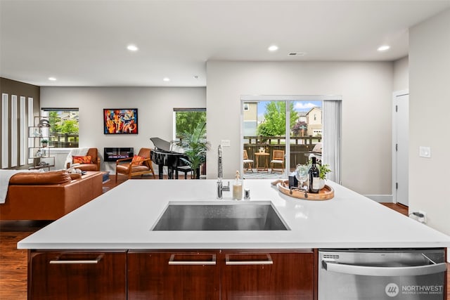 32867 Madrona Ave SE, Black Diamond, WA 98010 - kitchen featuring dishwasher, light countertops, open floor plan, recessed lighting, and a center island with sink