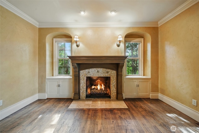 1126 E Alder St, Walla Walla, WA 99362 - unfurnished living room featuring healthy amount of natural light, wood finished floors, baseboards, ornamental molding, and a tile fireplace