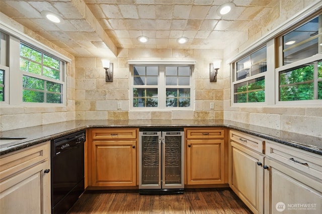 1126 E Alder St, Walla Walla, WA 99362 - kitchen featuring beverage cooler, black dishwasher, dark wood-style flooring, backsplash, and dark stone countertops
