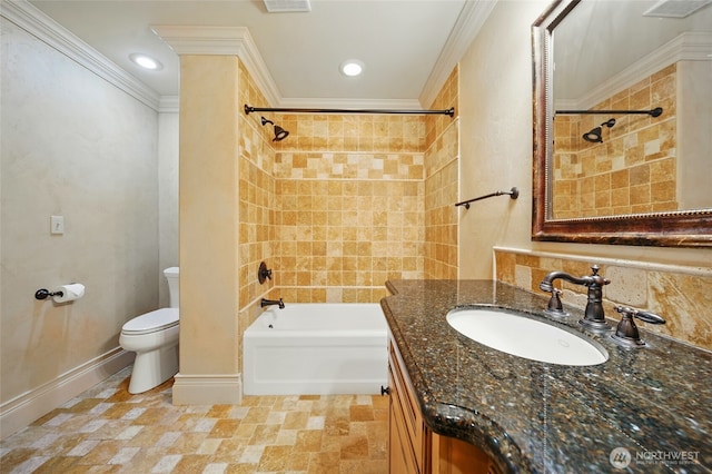 1126 E Alder St, Walla Walla, WA 99362 - bathroom featuring washtub / shower combination, vanity, toilet, ornamental molding, and baseboards