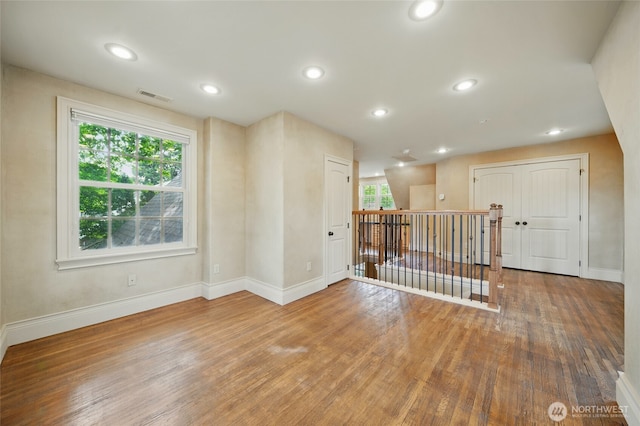 1126 E Alder St, Walla Walla, WA 99362 - spare room featuring baseboards, wood finished floors, and recessed lighting