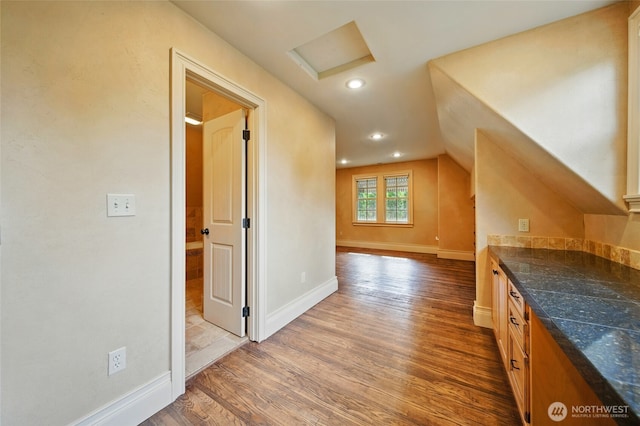 1126 E Alder St, Walla Walla, WA 99362 - additional living space featuring wood finished floors, vaulted ceiling, baseboards, and recessed lighting