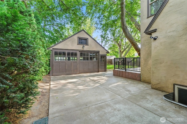 1126 E Alder St, Walla Walla, WA 99362 - view of patio with a garage and an outdoor structure