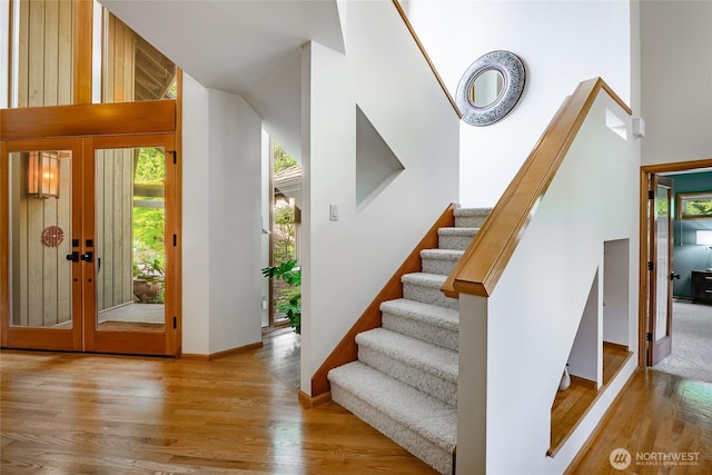5419 Quail Run, Blaine, WA 98230 - staircase with a high ceiling, wood finished floors, and baseboards