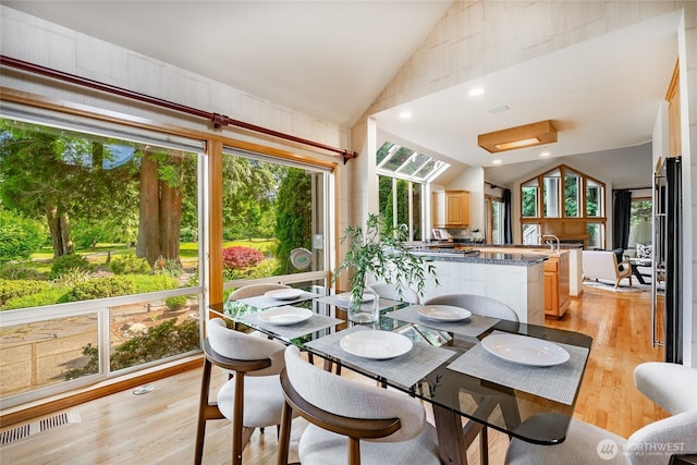 5419 Quail Run, Blaine, WA 98230 - dining room with vaulted ceiling and light wood-style flooring