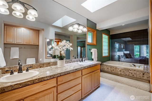 5419 Quail Run, Blaine, WA 98230 - bathroom featuring a skylight, double vanity, tiled bath, and tiled shower