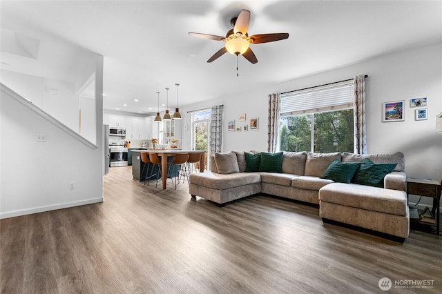 15315 91st Ave SE, Yelm, WA 98597 - living area with ceiling fan, healthy amount of natural light, wood finished floors, and recessed lighting
