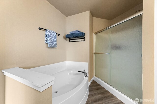 15315 91st Ave SE, Yelm, WA 98597 - bathroom featuring wood finished floors, a shower stall, and a bath