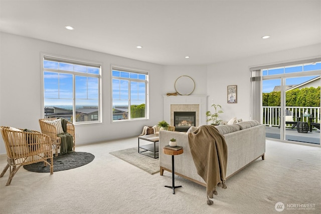 3421 Highfield Ct, Bellingham, WA 98226 - living area featuring carpet, a tiled fireplace, and recessed lighting