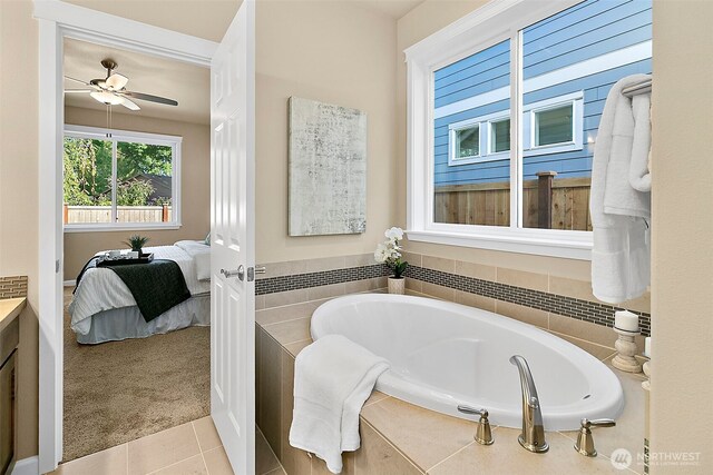 7391 Mirasett St SW Lot 42, Tumwater, WA 98512 - ensuite bathroom with a garden tub, tile patterned floors, a ceiling fan, and vanity